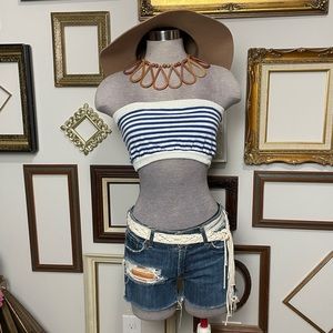 A country girl cut off jeans & lollipops tequila shots tube tops & liquor stops